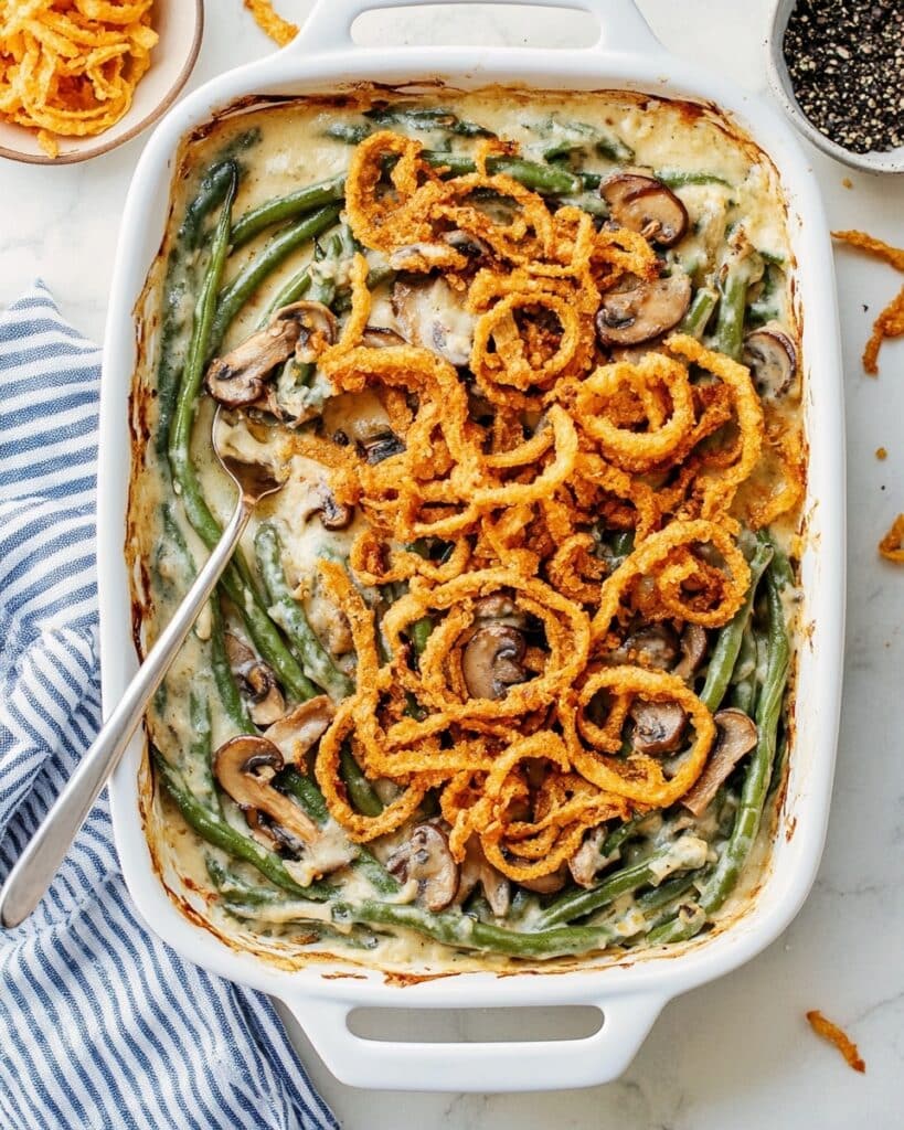 Creamy Green Bean Casserole with Mushrooms, Fried Onions, and Parmesan Recipe