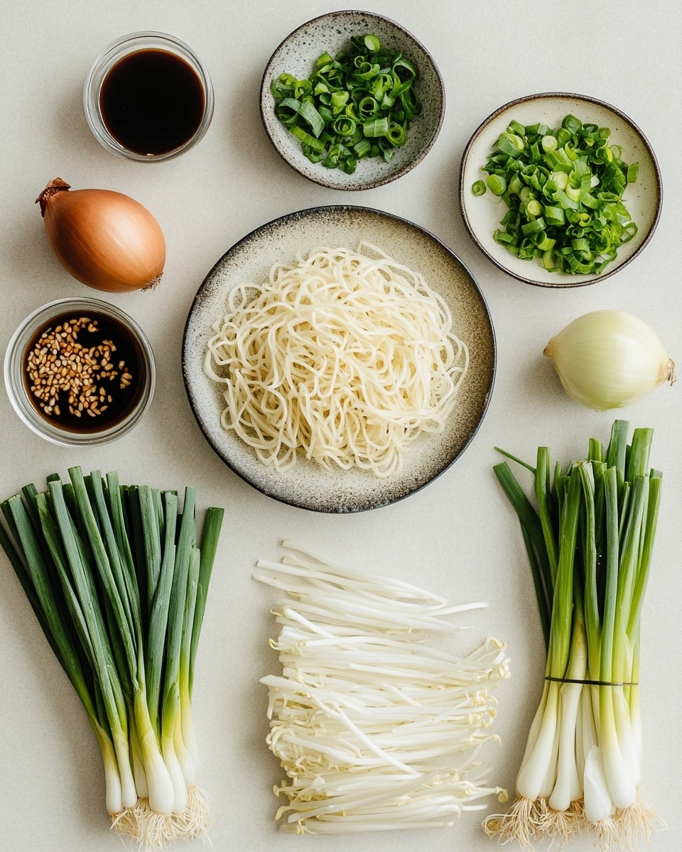 A white plate filled with stir-fried noodles that have a rich golden-brown color, mixed with light beige cooked bean sprouts and bright green scallions scattered throughout. The noodles are twisted and tangled, creating a textured, slightly glossy layer that fills the plate. The background is a white marbled surface with a soft pink checkered cloth partially visible in the corner alongside a pink glass with ice. A pair of pale pink chopsticks rest on the side near a white bowl with green vegetables. Photo taken with an iphone --ar 4:5 --v 7
